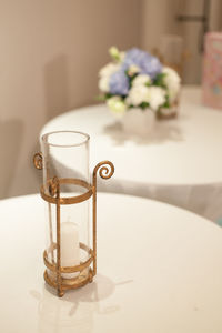 Close-up of vase on table at home