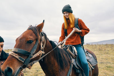 Woman riding horse