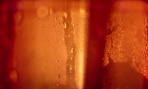 Close-up of wet glass window