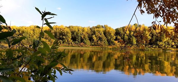 Scenic view of lake against sky during autumn