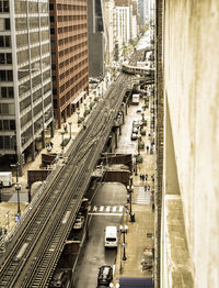 High angle view of street amidst buildings in city