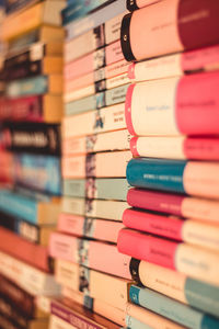 Close-up of books in shelf at store