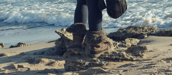 Low section of man on beach