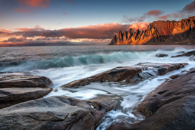 Scenic view of sea against sky during sunset