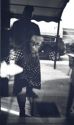 People standing in car