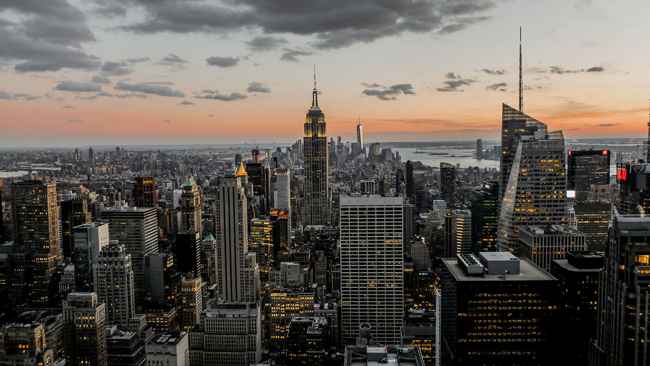 skyscraper, cityscape, city, urban skyline, architecture, modern, building exterior, finance, travel destinations, sunset, no people, business finance and industry, outdoors, downtown district, cloud - sky, sky, day