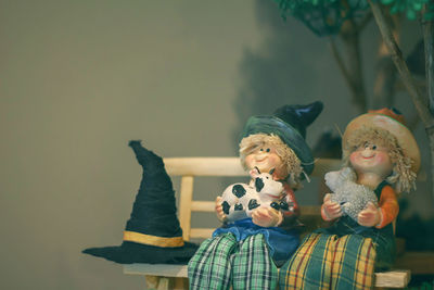 Two women sitting by toys