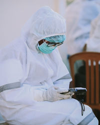 Nurses use personal protective equipment