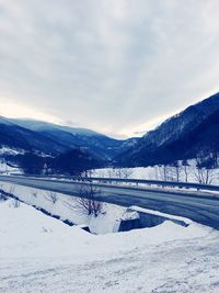 Scenic view of mountains against sky during winter