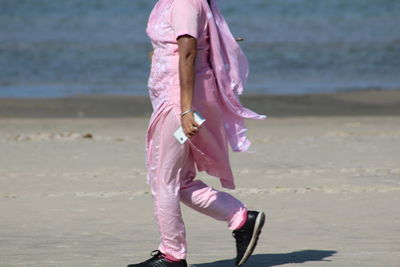 Full length of woman on beach