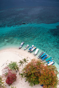 High angle view of boats moored on beach