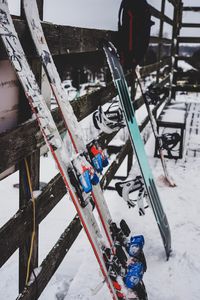 High angle view of people skiing on snow covered field