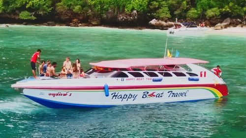 People on boat in sea