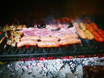 Close-up of meat on barbecue grill