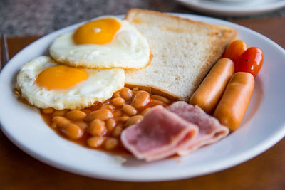 High angle view of fresh english breakfast served in plate