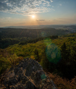 Scenic view of landscape against sky during sunset