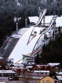 High angle view of buildings and trees during winter