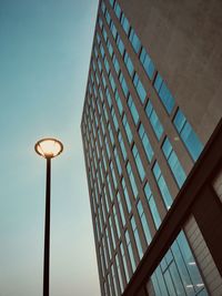 Low angle view of street light against sky