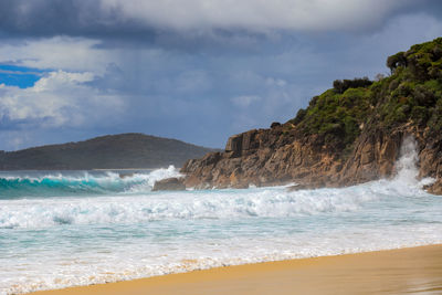 Scenic view of beach against sky