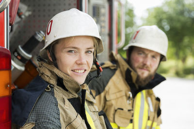 Firefighters in front of fire truck