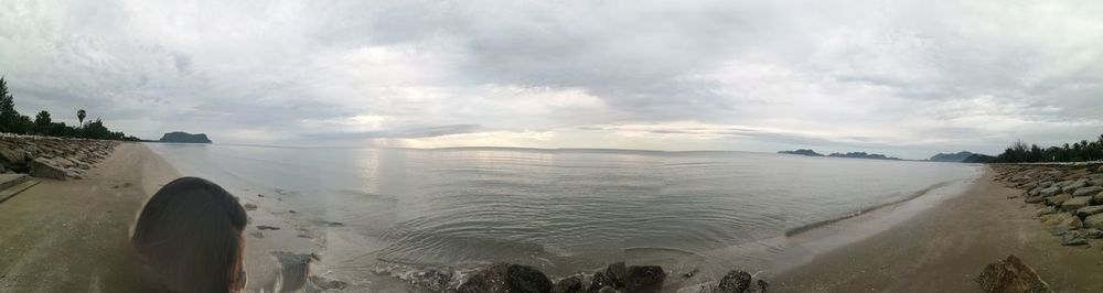 Panoramic view of beach against sky