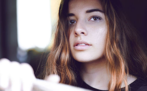 Close-up portrait of young woman