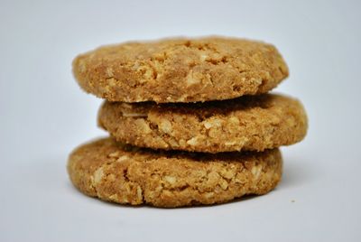 Close-up of cookies against white background