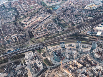 High angle view of road amidst buildings in city