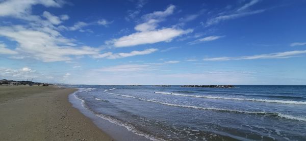 Scenic view of beach against sky