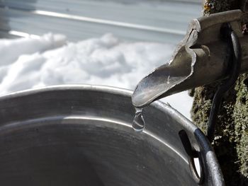 Bucket under water drop as safety for conversation