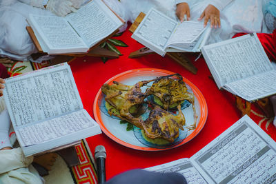 High angle view of open book on table