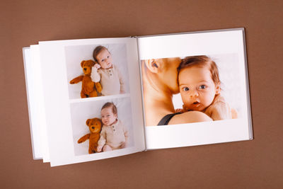 High angle view of cute girl with teddy bear