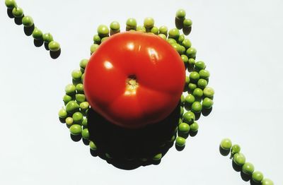 Close-up of fruits against white background