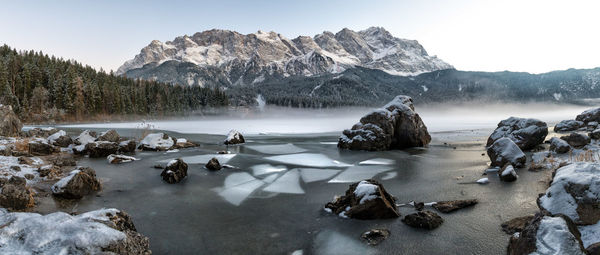 Scenic view of frozen lake against mountain