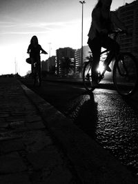 People walking on road in city