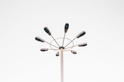 Low angle view of street light against clear sky