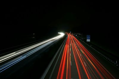 Cars moving on road at night