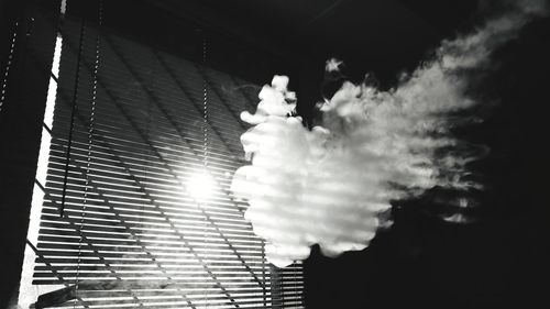 Low angle view of glass against the sky