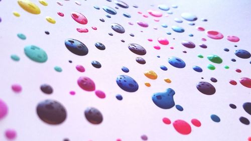 Colorful paints on white table