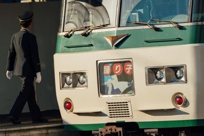 Man standing in bus