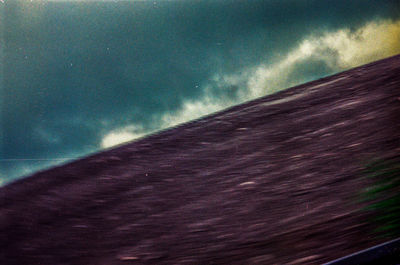 Scenic view of sea against dramatic sky