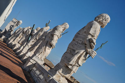 Low angle view of statue against sky