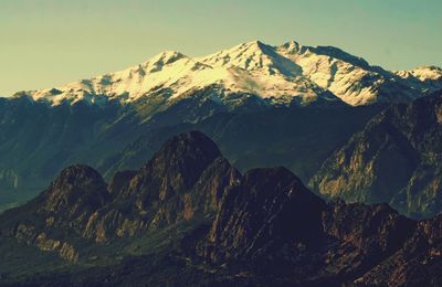 Scenic view of snowcapped mountains against sky