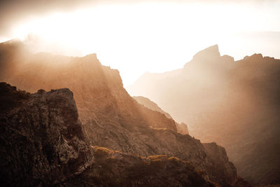 Scenic view of rocky mountains against sky