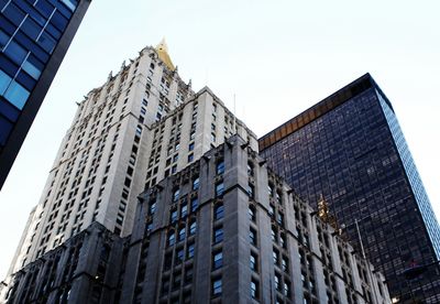 Low angle view of skyscraper against sky