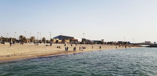 Scenic view of beach against clear sky