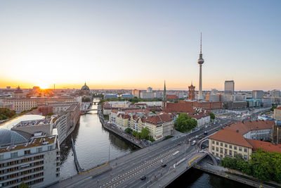 The center of berlin with the iconic tv tower at sunset