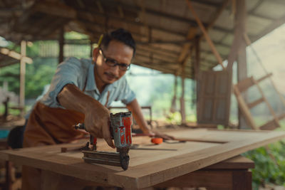 Man working on table