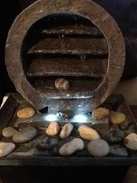 Close-up of stones in container