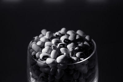 Close-up of candies against black background